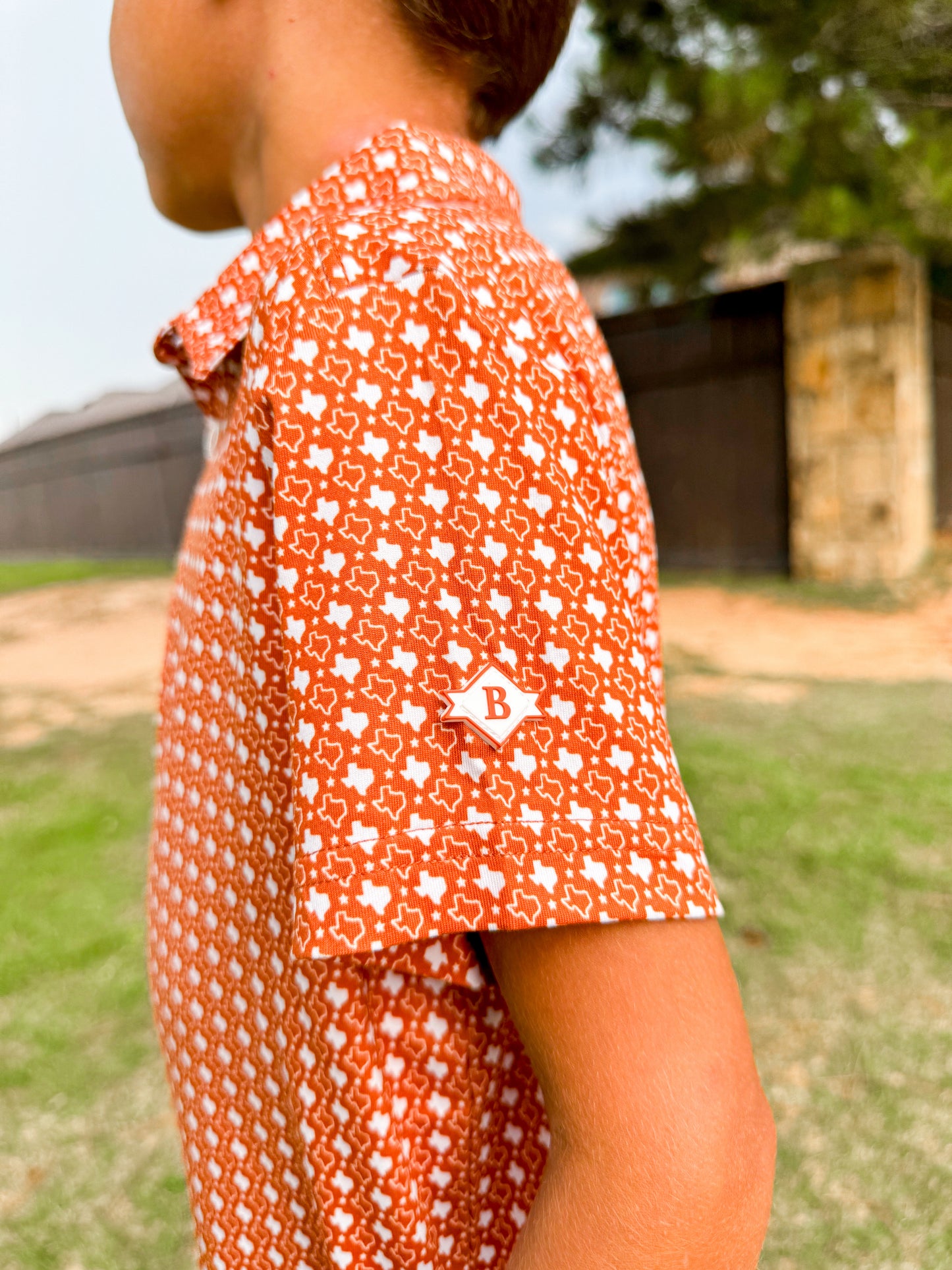 Burlebo Boys orange Texas polo - Ethan and Emily