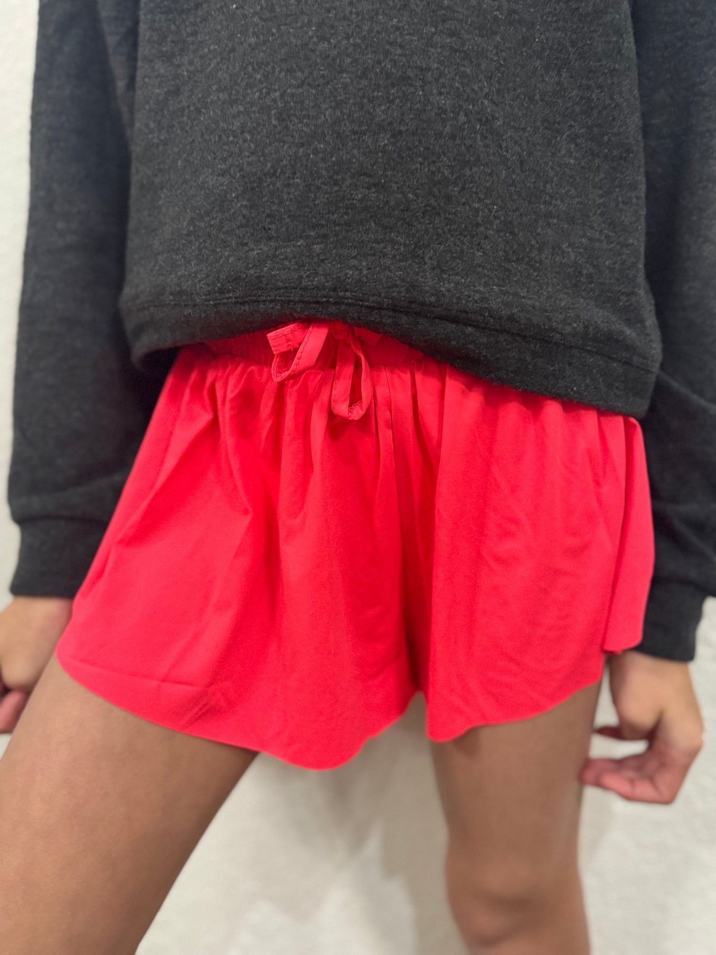 Girls butterfly shorts in neon orange - Ethan and Emily